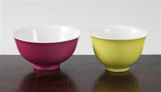 A Chinese ruby ground bowl and a similar yellow ground cup, Yongzheng marks, probably Republic period, diameter 9cm and 7.7cm, hairline